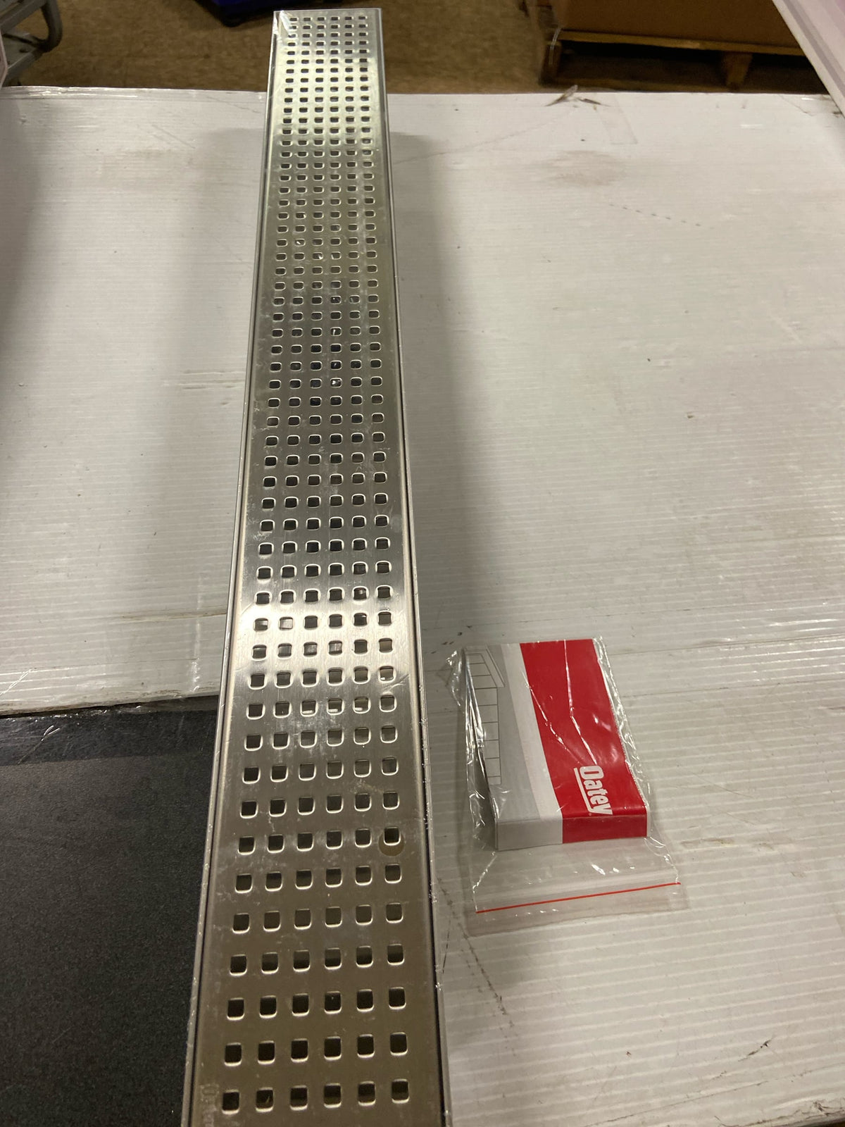 Oatey Designline 28 in. Stainless Steel Linear Shower Drain with Square Pattern Drain Cover, Silver