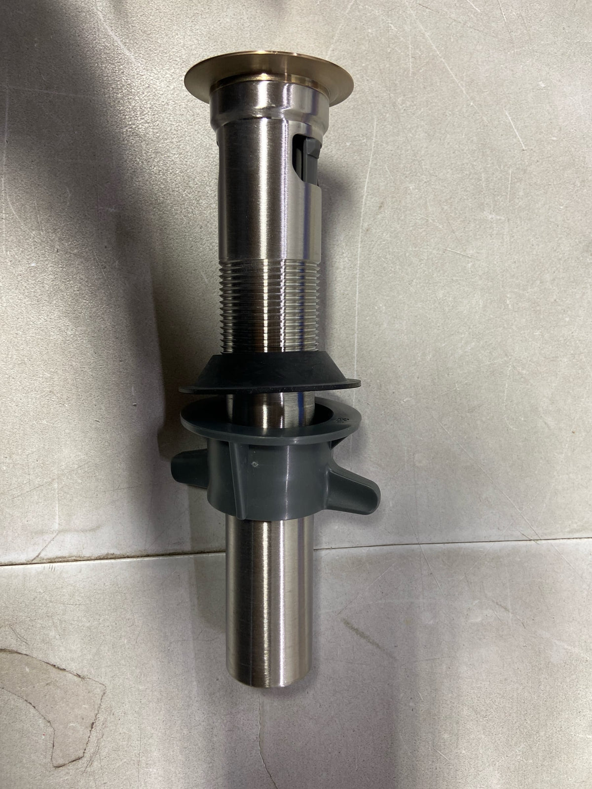 Delta RP101630CZ Push Pop Up Drain with Overflow and Metal Tail Piece - Champagne Bronze
