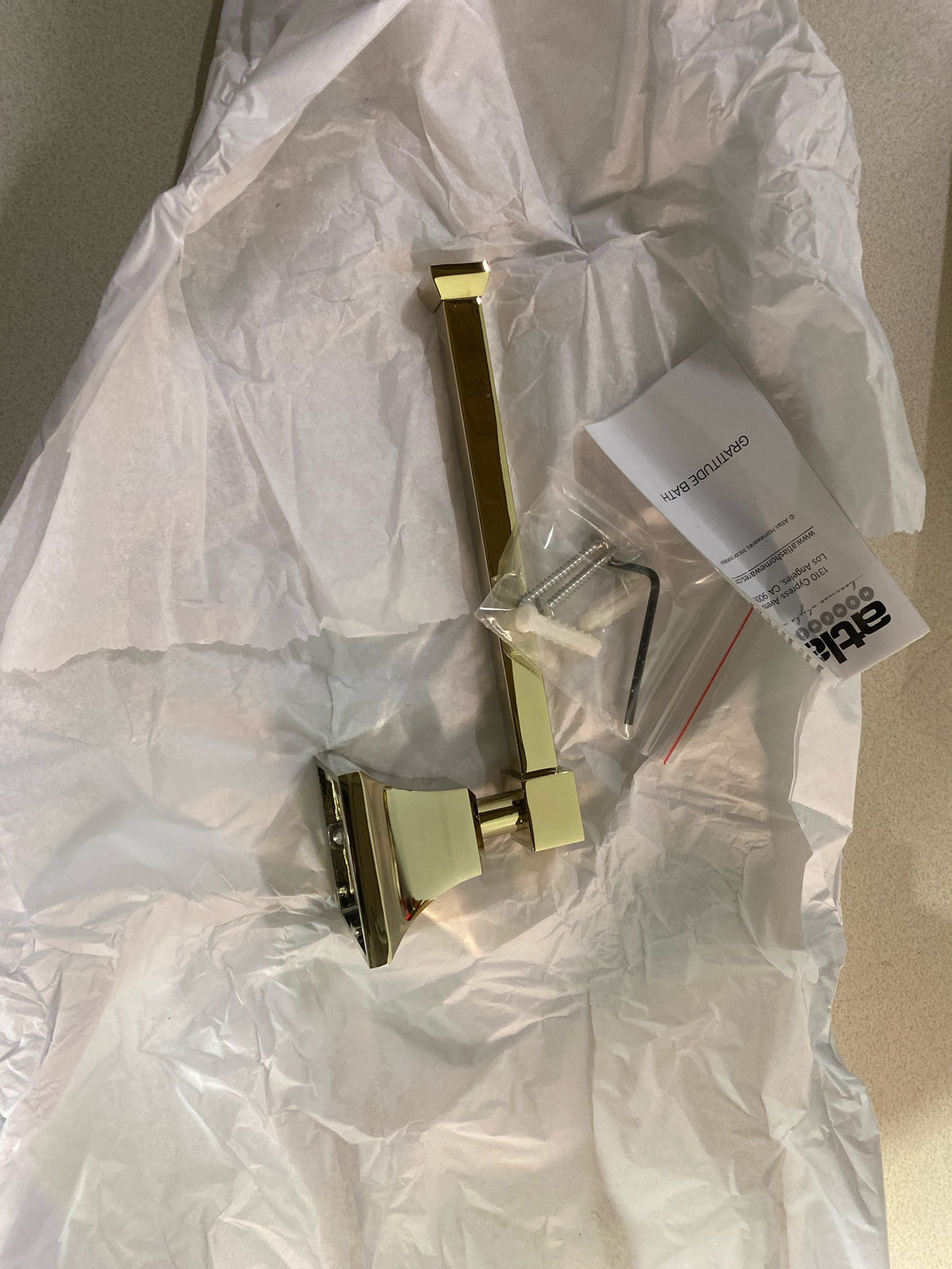Atlas Homewares GRATP-PN 7-1/4 Inch Wide Single Post Toilet Paper Holder from the Gratitude Collection - Polished Nickel
