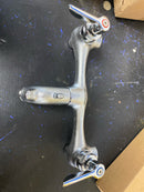 American Standard 8350.235.004 Exposed Yoke Wall-Mount Utility Faucet with Metal Lever Handles, Rough Chrome