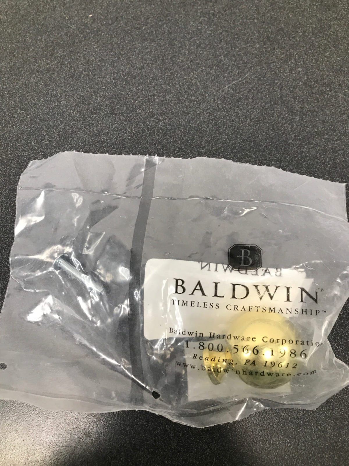 Baldwin 4961030 1.25 in. round cabinet knob, polished chrome
