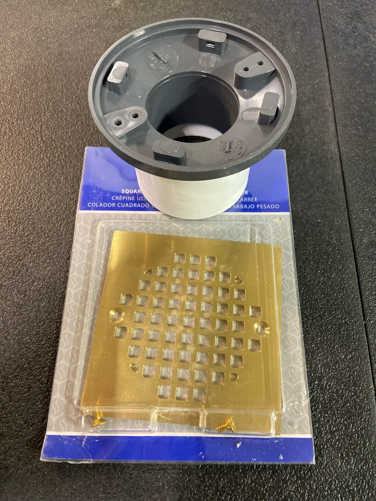 Jones Stephens D53298 2" PVC Over Pipe Fit Drain Base with 2" Plastic Spud and 4" Polished Brass Strainer - N/A