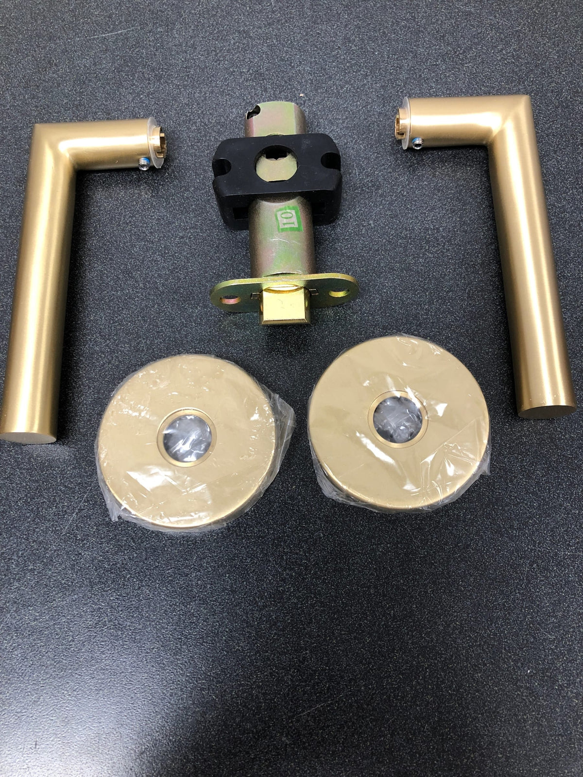 Emtek C5109STUUS4 Stuttgart Passage Door Lever Set with Disk Rose and CF Mechanism from the Brass Modern Collection - Satin Brass