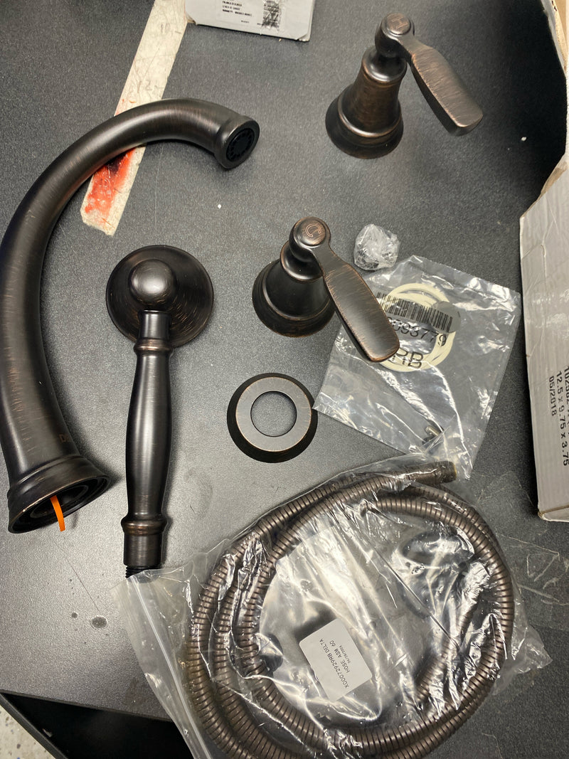 Delta T4732-RB Woodhurst Deck Mounted Roman Tub Filler with Built-In Diverter - Includes Hand Shower - Venetian Bronze