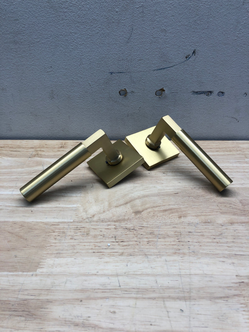 Emtek 5050HECUS4LH Hercules Left Handed Non-Turning Two-Sided Dummy Door Lever Set with Square Rose from the Brass Modern Collection - Satin Brass