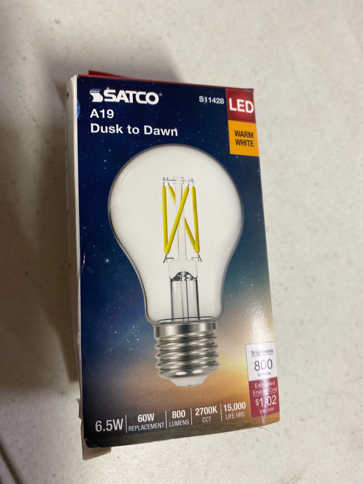 Satco Lighting S11428 Single 6.5 Watt Vintage Edison A19 Medium (E26) LED Dusk to Dawn Bulb - 800 Lumens, 2700K, and 80CRI - Clear