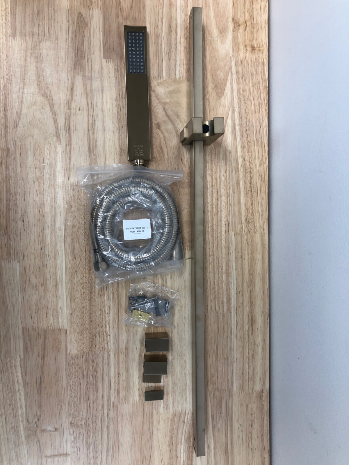 Delta 57530-CZ 1.75 GPM Vero Hand Shower Package - Includes Hand Shower, Slide Bar, Hose, and - Champagne Bronze