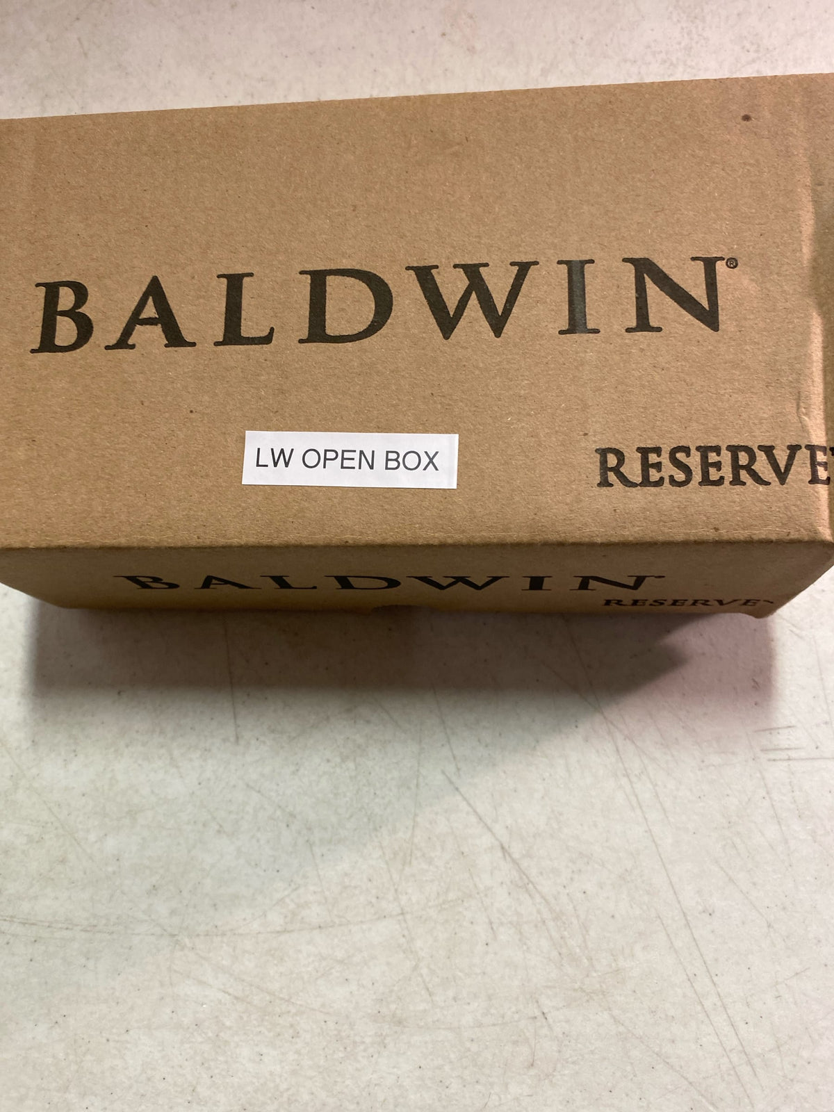 Baldwin Reserve Curve Polished Brass Bed/Bath Door Lever with Traditional Round Rose-PV.CUR.R.TRR.003