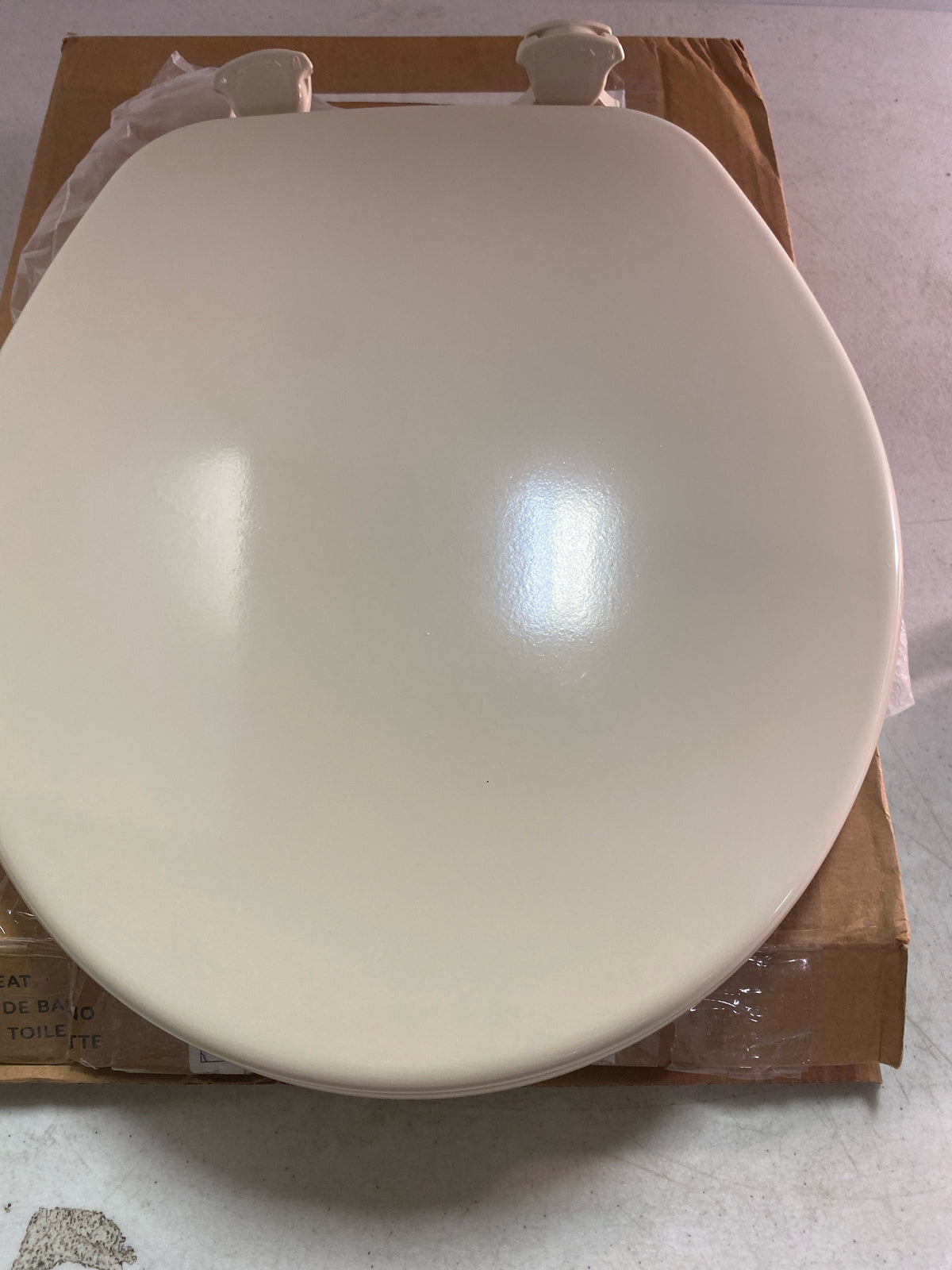Bemis 540EC 006 Round Closed-Front Enameled Wood Toilet Seat with Flat Cover - Bone