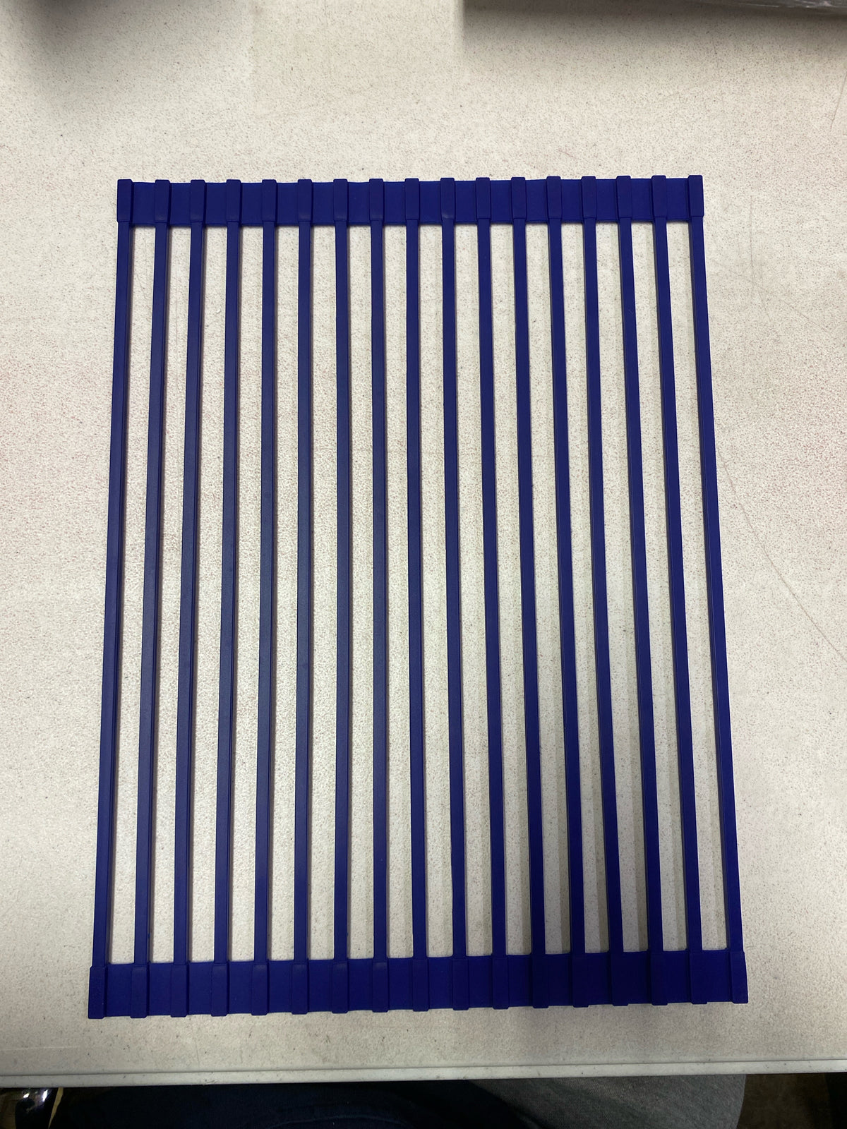 Swiss Madison SM-KG701-NV 16-7/8" L x 12-15/16" W Silicone Roll Up Sink Grid - Navy Blue