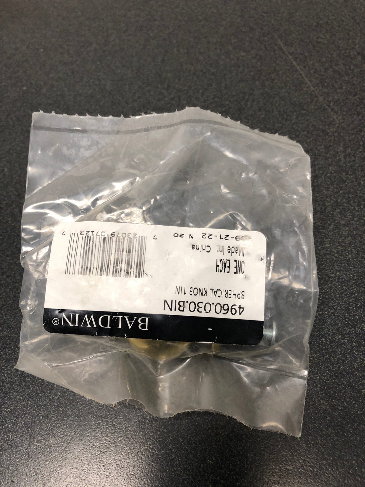Baldwin 4960030 Round Cabinet Knob in Bright Brass