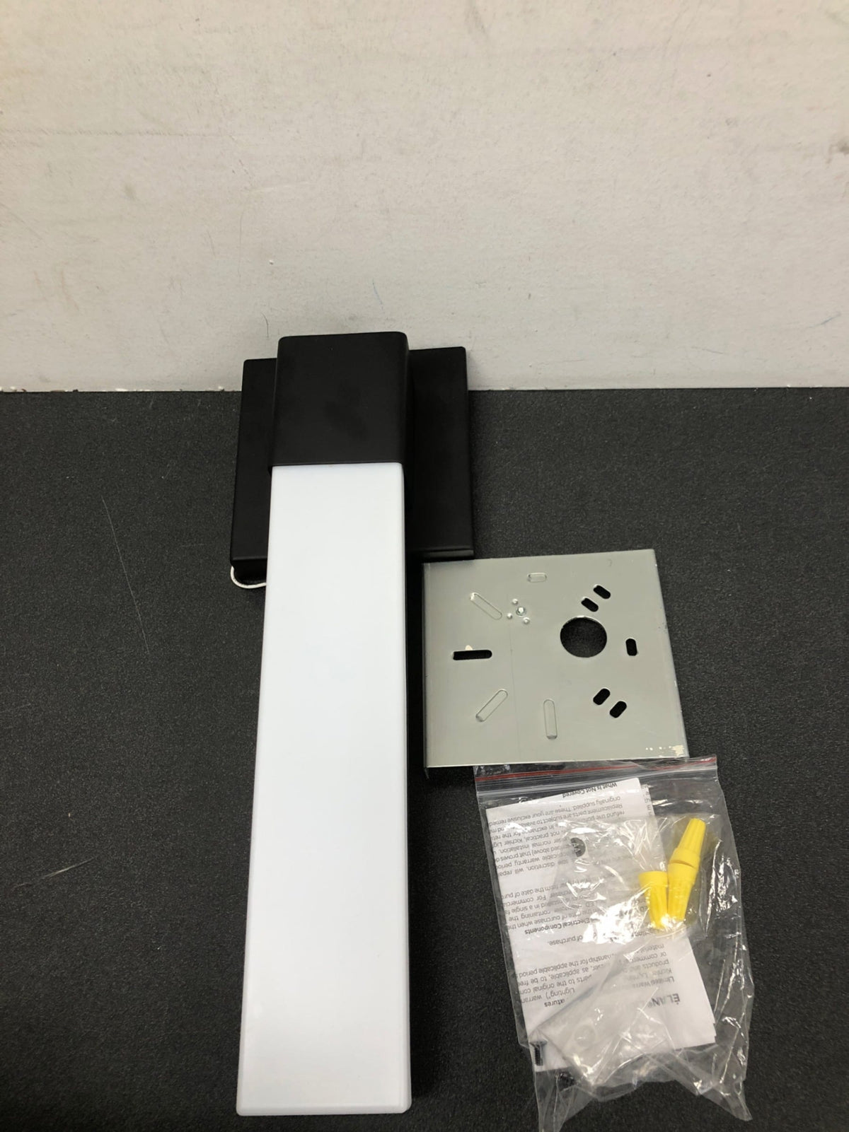 Elan 84186 Neltev Single Light 15" Tall Integrated LED Bathroom Sconce - Matte Black
