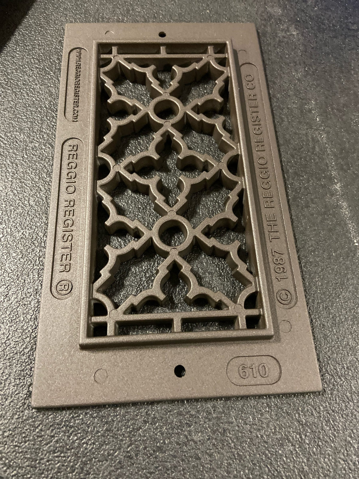 Reggio Registers 610-ARBH Scroll 4" x 8" Aluminum Floor / Wall Grille with Mounting Holes - Oil Rubbed Bronze Aluminum