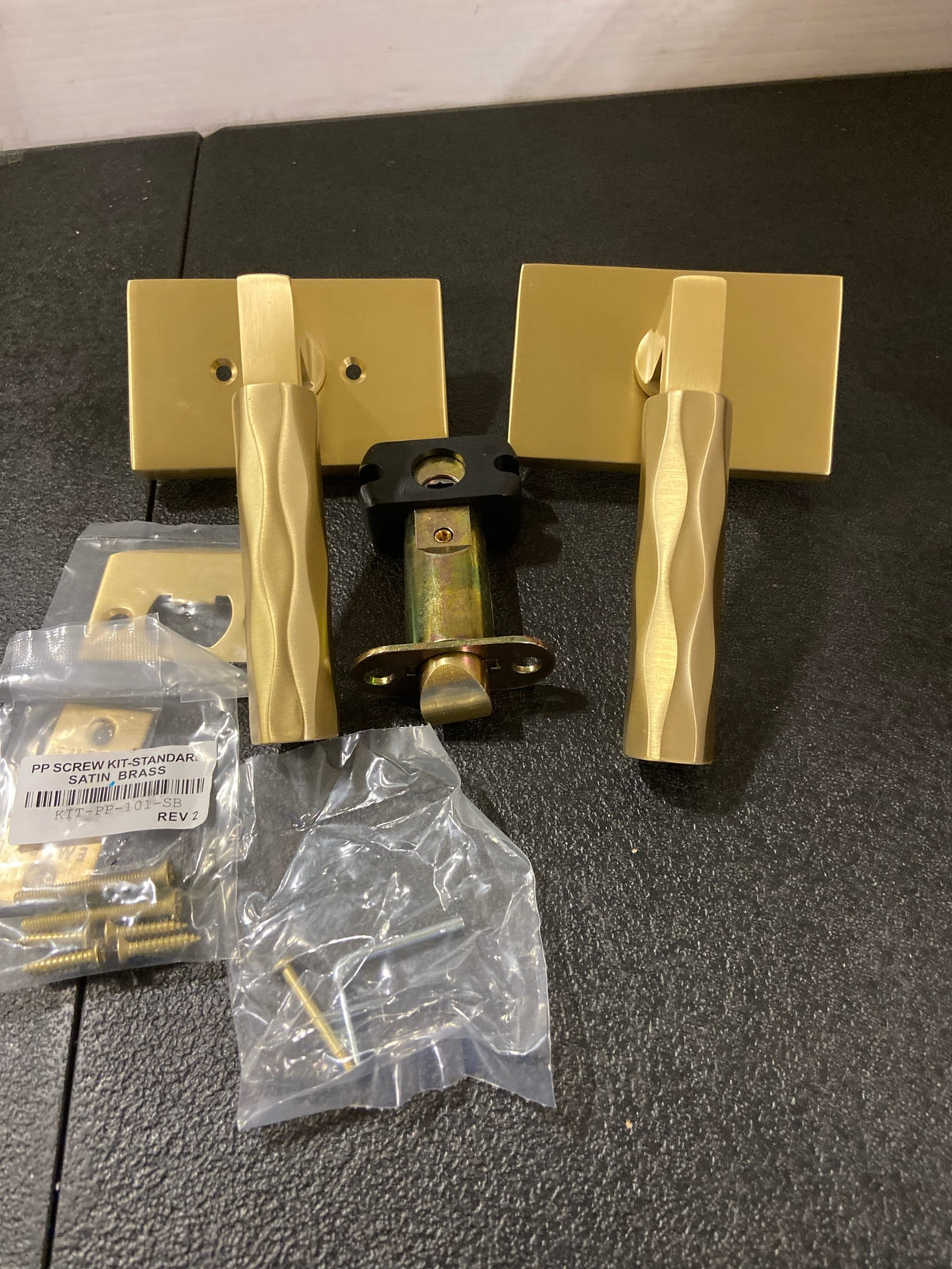Emtek 520TRUS4 RH L-Sq Modern rectangular rosette Tribeca Privacy Door Lever Set from the SELECT Brass Collection - Satin Brass