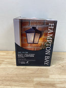 Hampton bay 5294503012 Malena 7.83 in. 1-Light Black Hardwired Outdoor Wall Light Lantern Sconce Light with Clear Seeded Glass