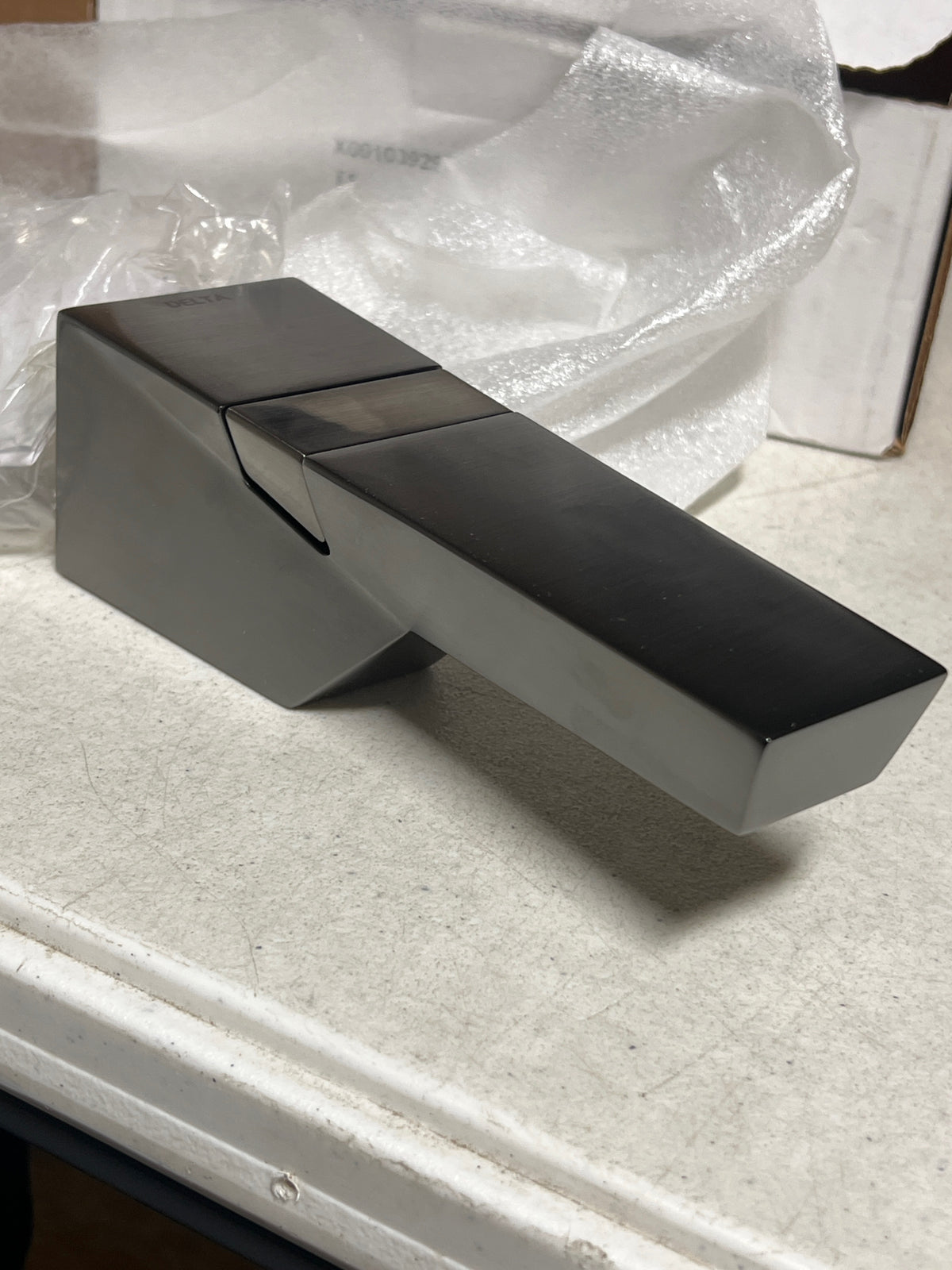 Delta RP93248KSPR Trillian 7" Integrated Diverter Tub Spout - Lumicoat Black Stainless