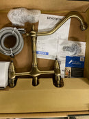 Kingston Brass KS1273ALBS Heritage Bridge Kitchen Faucet with Brass Sprayer, Antique Brass