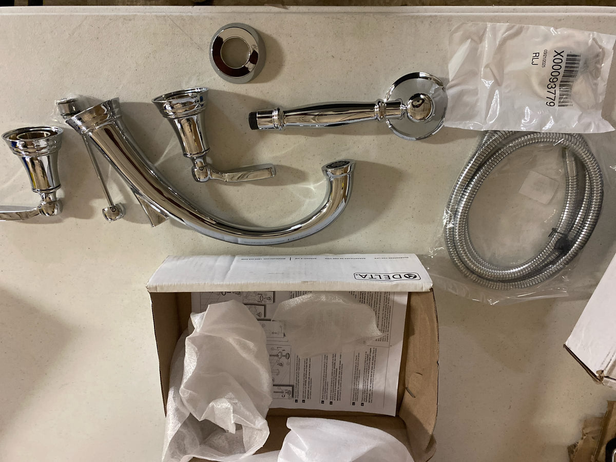 Delta T4732 Woodhurst Deck Mounted Roman Tub Filler with Built-In Diverter - Includes Hand Shower - Chrome