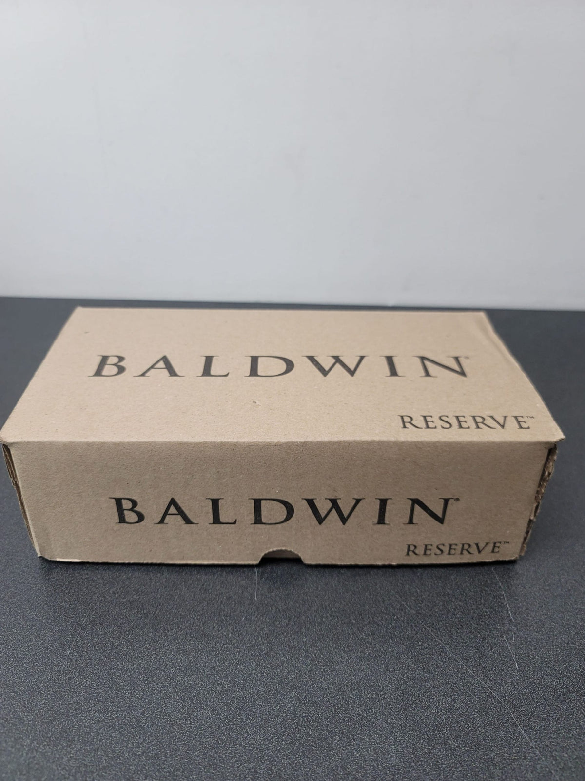 Baldwin PSELLTRR190 Ellipse Passage Door Knob with Round Rose - Satin Black
