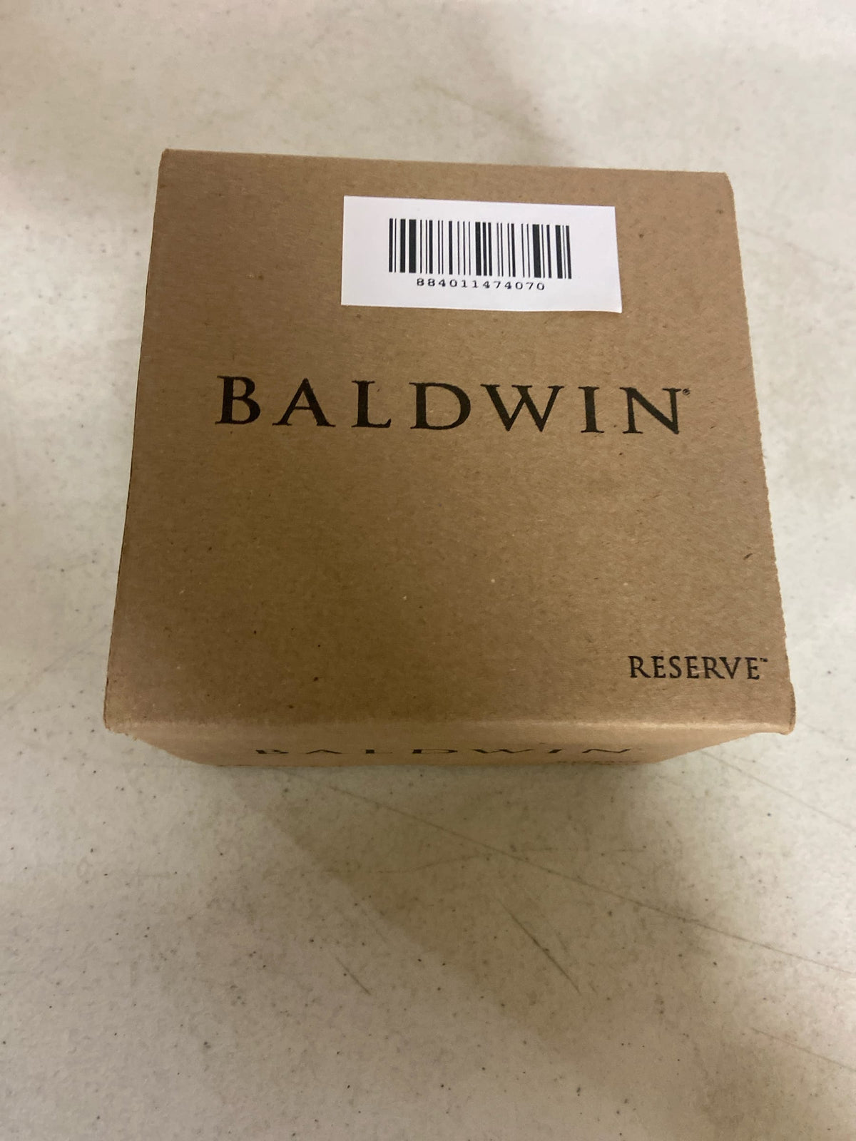 Baldwin HDARCRRSR481 Arch Right Handed Non-Turning One-Sided Surface Mount Dummy Door Lever with Square Rosette from the Reserve Collection - Dark Bronze