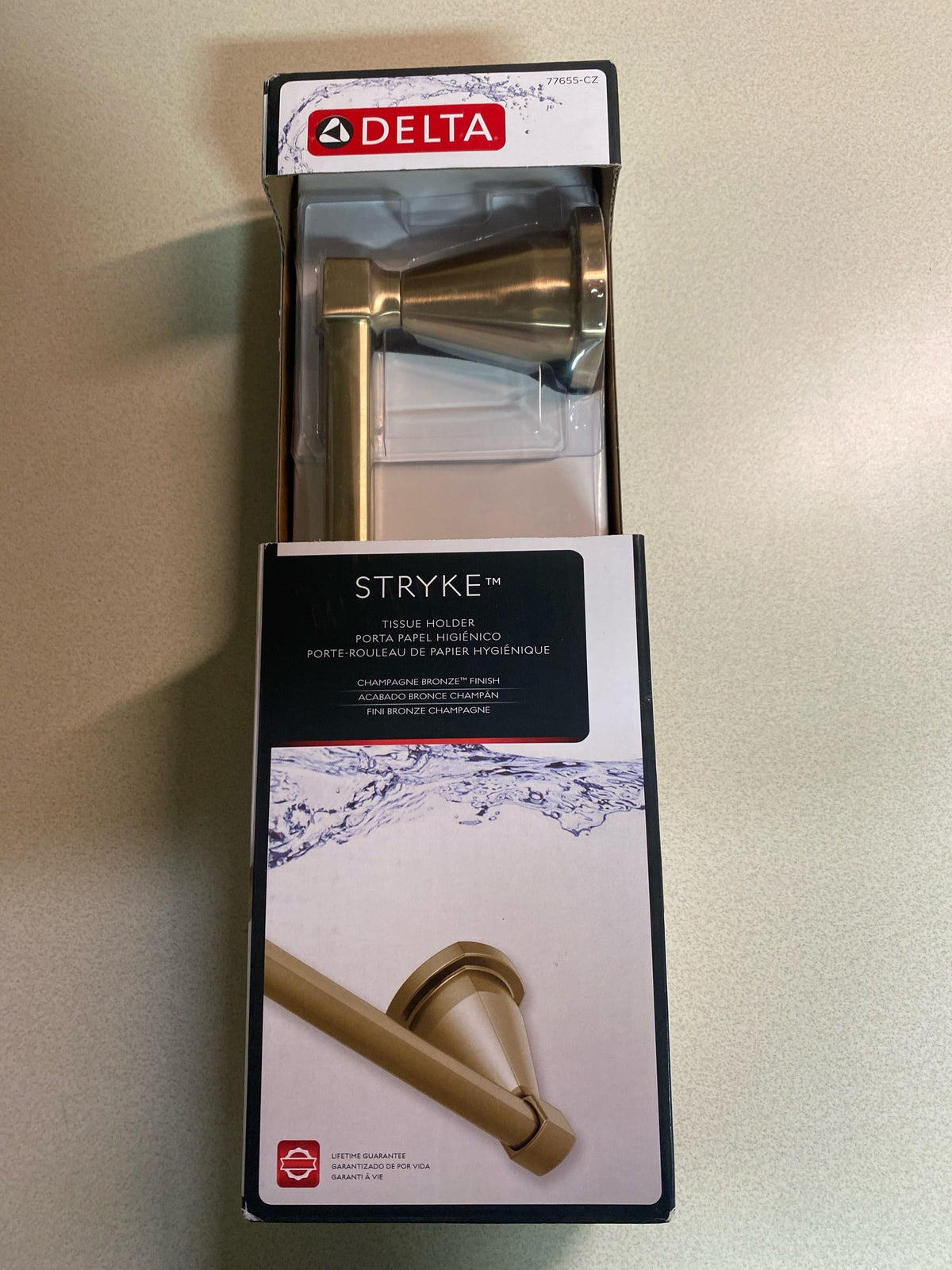 Delta 77655-CZ Stryke Wall Mounted Toilet Paper Holder - Champagne Bronze