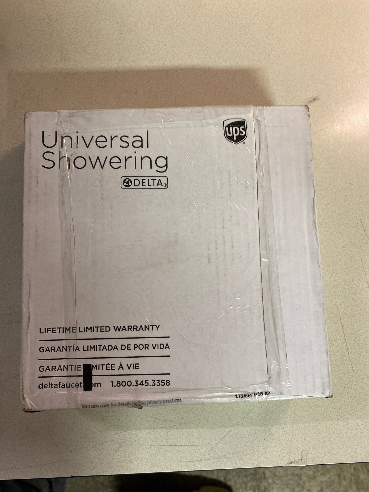 Delta RP104122SN Universal Showering 1.75 GPM Single Function Shower Head with Touch-Clean Spray Holes - SpotShield Brushed Nickel