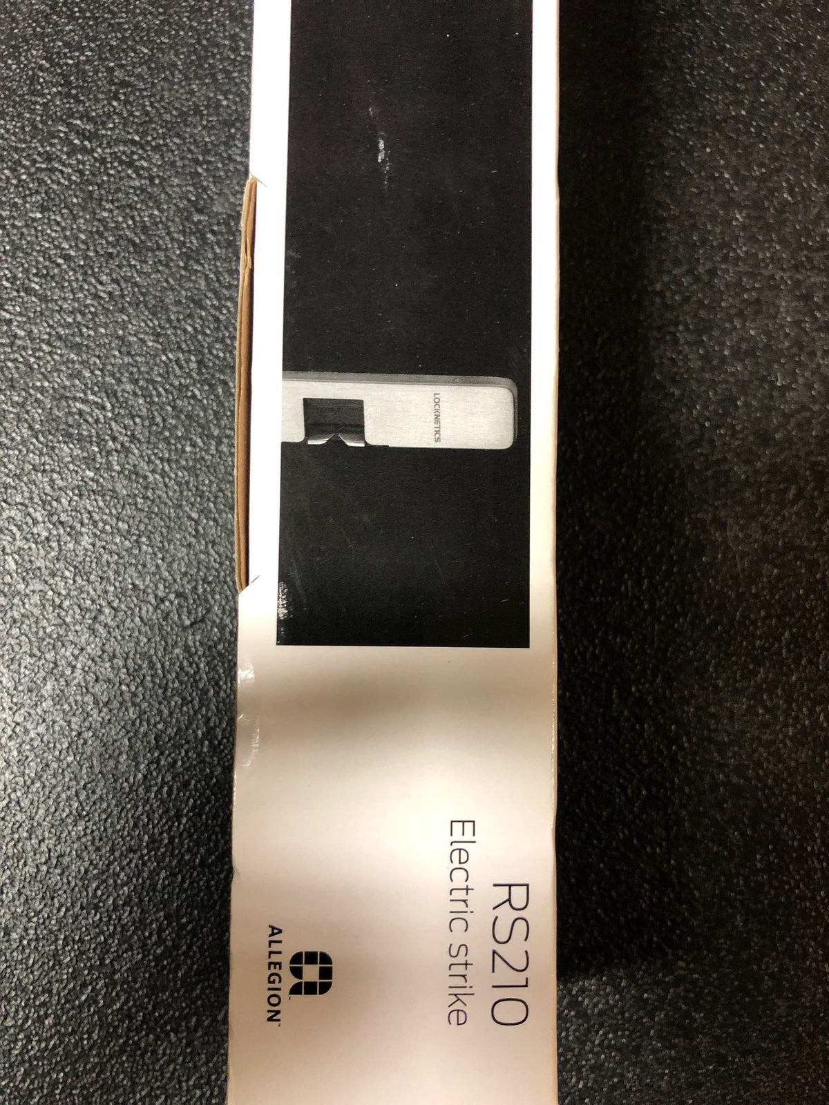 RS210_630 American Locksets. Locknetics RS210-32D Electric Rim Strike, Surface Mounted, Field Selectable (Safe/Secure), Satin Stainless Steel Finish
