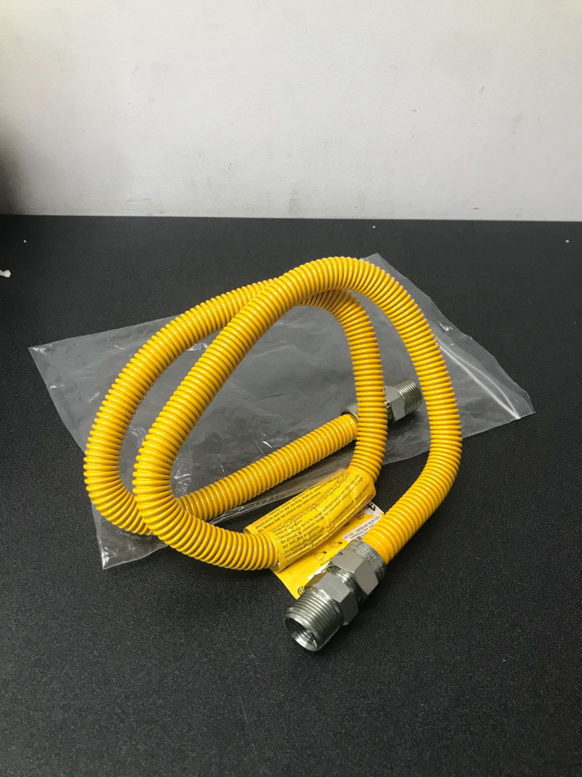 Jones Stephens G71150 48" Stainless Steel Gas Connector with 3/4" and 3/4" Fittings - Yellow