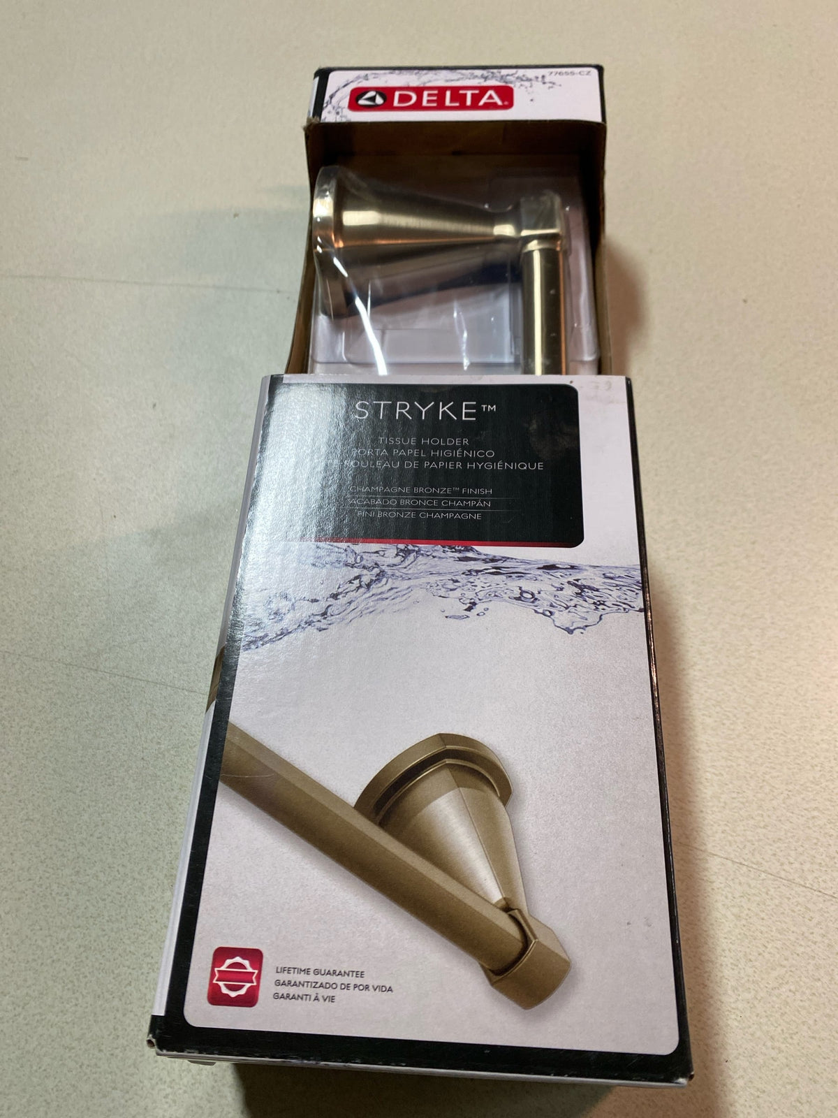 Delta 77655-CZ Stryke Wall Mounted Toilet Paper Holder - Champagne Bronze