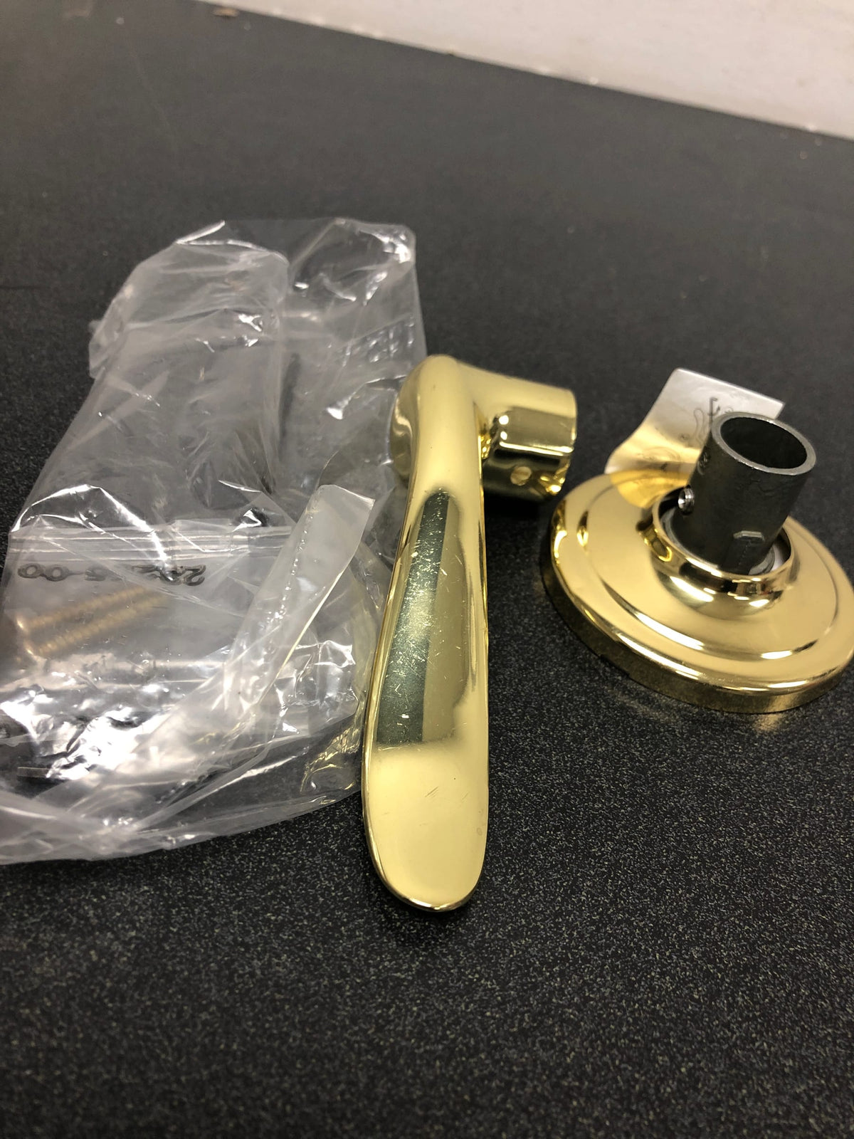 Kwikset tustin lever half dummy in bright brass