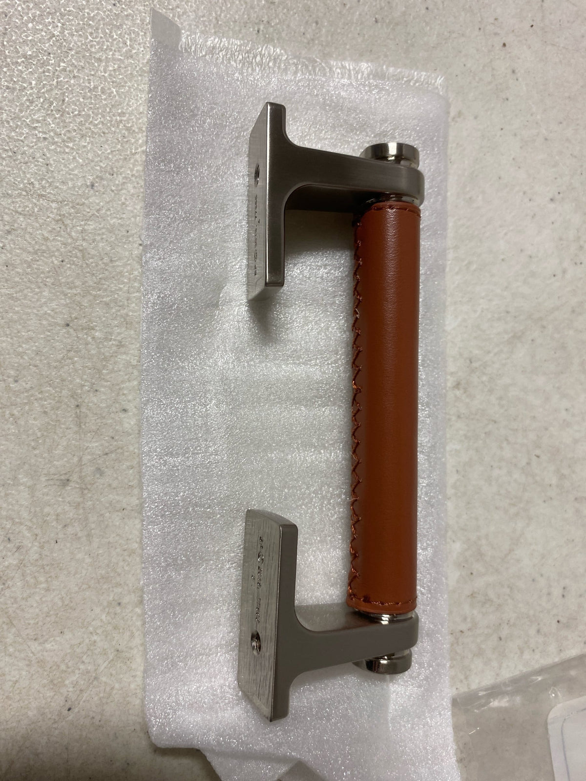 Belwith Keeler B077979LRSN Reserve 3-3/4" Center to Center Luxury Leather Cabinet Handle / Drawer Pull - Mixed Materials - Satin Nickel / Brown Leather
