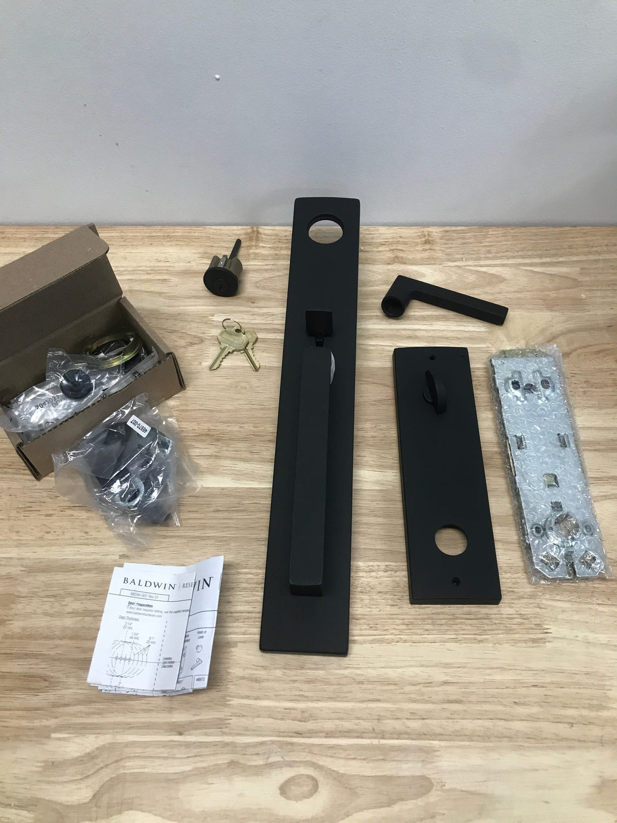 Baldwin EESANxSQUCQE190 Santa Cruz Full Plate Single Cylinder Keyed Entry Handleset with Interior Square Lever and Emergency Egress Function - Satin Black