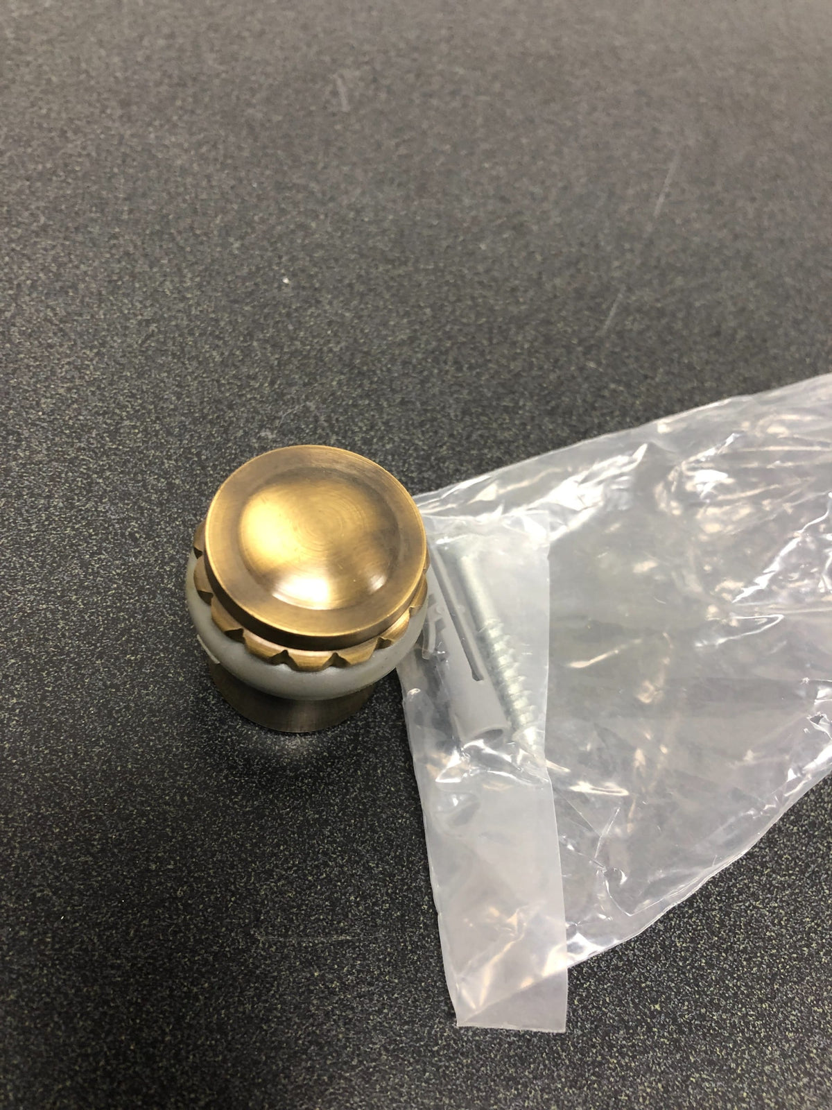 Deltana UFBP4505U5 1-5/8 Inch Height Solid Brass Round Universal Floor Bumper / Door Stop with Decorative Cap - Antique Brass
