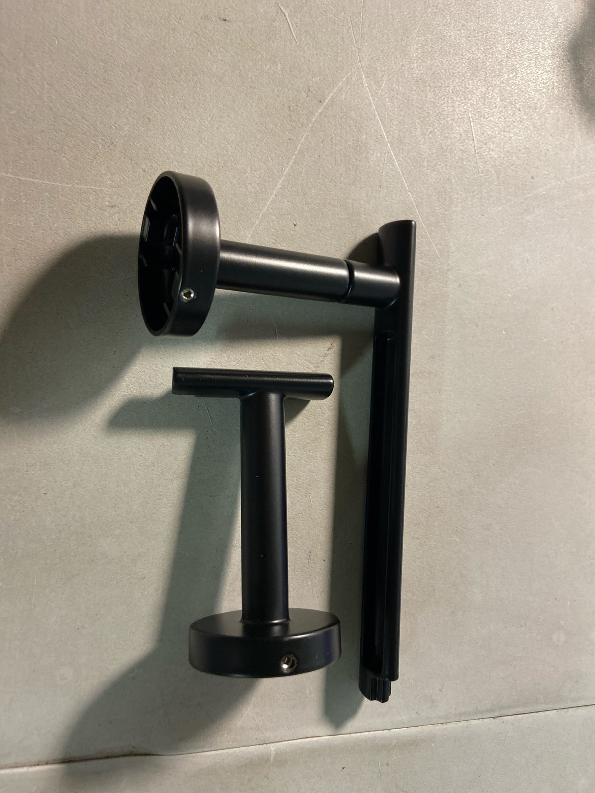 Delta 74250-BL Altado Wall Mounted Pivoting Toilet Paper Holder - Matte Black