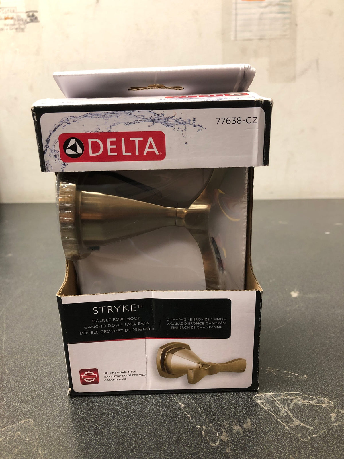 Delta 77638-CZ Stryke Double Robe Hook - Champagne Bronze