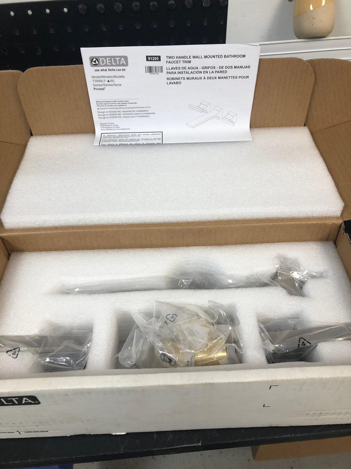Delta T3599LF-SS-PR-WL Pivotal 1.2 GPM Wall Mounted Widespread Bathroom Faucet - Less Drain - Lumicoat Stainless