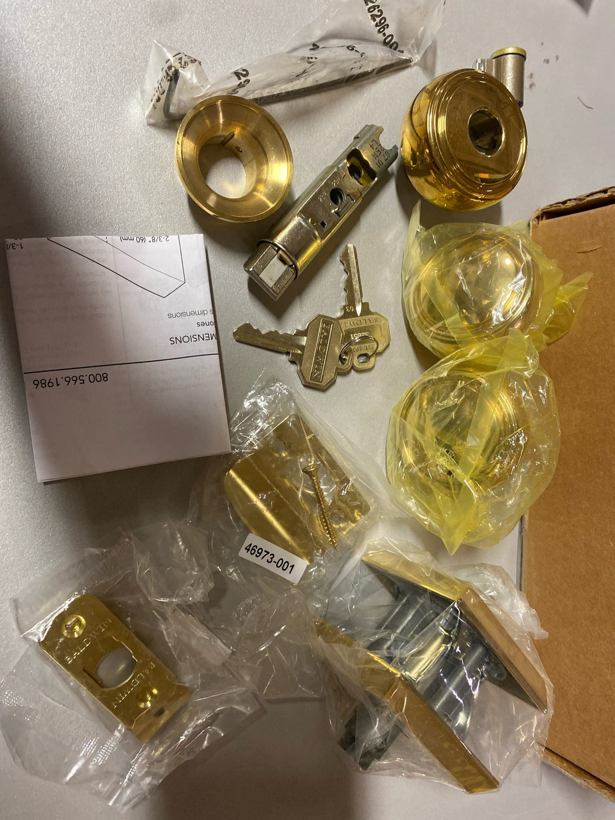 Baldwin PS.BRE.CHR Bremerton Passage Door Knob Set with Chamfered Square Rose from the Reserve Collection - Non-Lacquered Brass