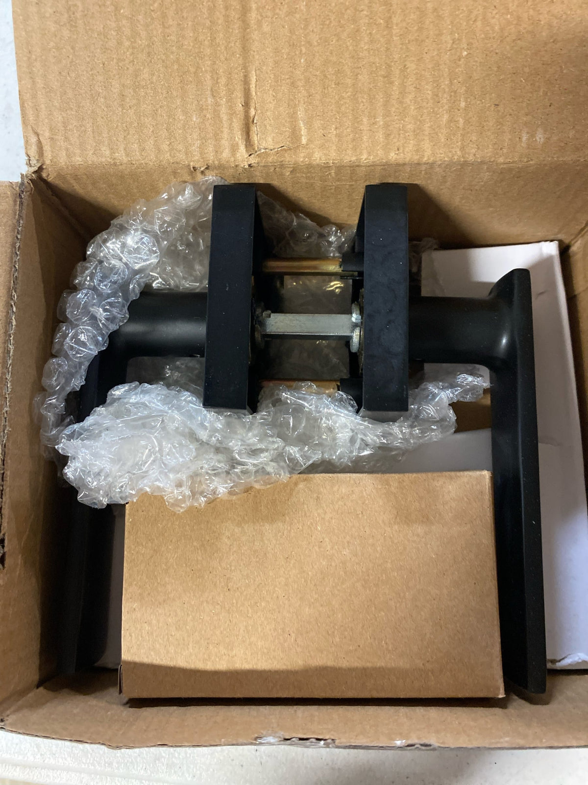 Weslock 007003232FR20 Utica Passage Door Lever Set with Square Rose from the Transitional Collection - Matte Black