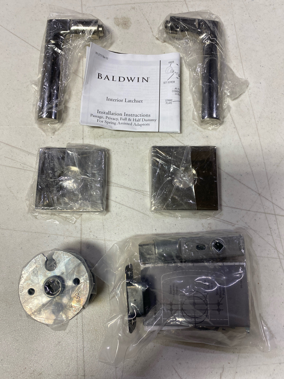 Baldwin L021055PASS L021 Passage Door Lever Set with R017 Rose from the Estate Collection - Polished Nickel