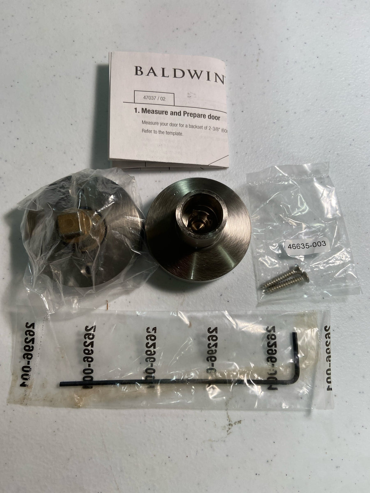 Contemporary Non-Turning One-Sided Surface Mount Dummy Door Knob with Round Rosette from the Reserve Collection - Satin Nickel