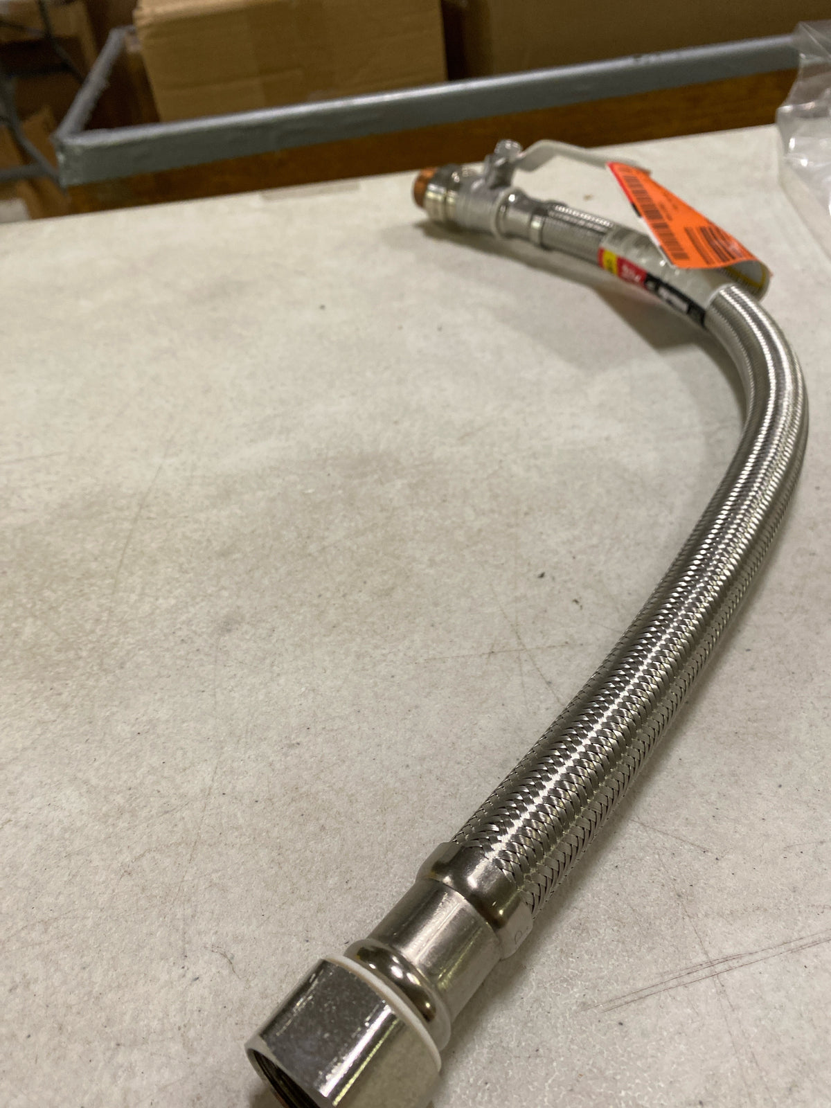Everbilt EBBS34PF18BV 3/4 in. PTC x 3/4 in. FIP x 18 in. Braided Stainless Steel Water Heater Connector with Ball Valve