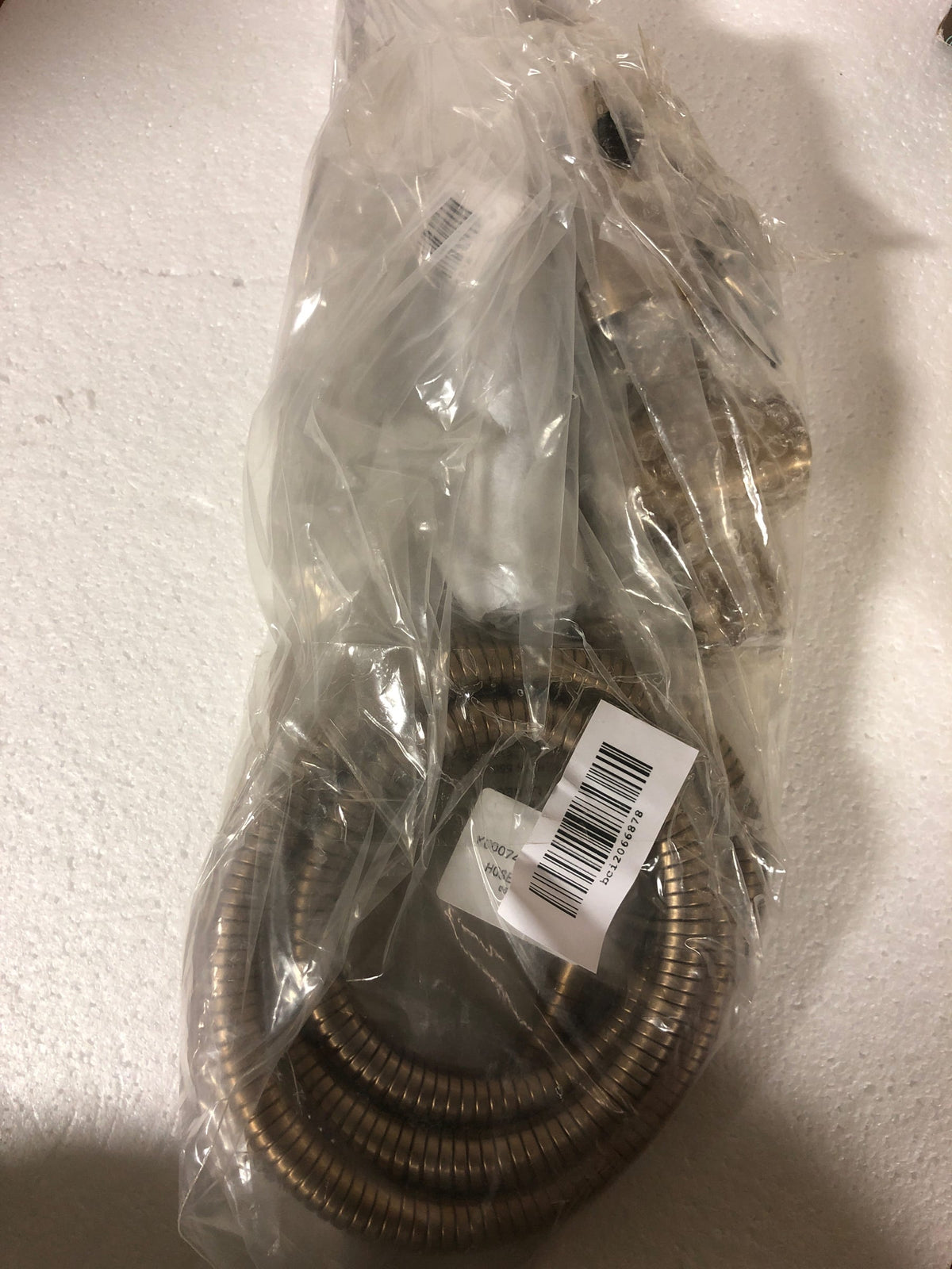 Delta 57085-CZ Grail 1.75 GPM Single Function Hand Shower Package - Includes Slide Bar and Hose - Champagne Bronze