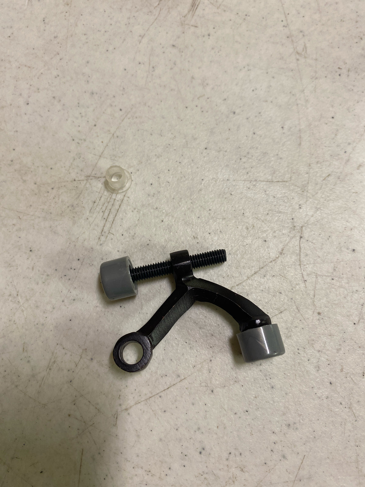 Deltana HP70U10B Hinge Mounted Solid Brass Hinge Pin Stop