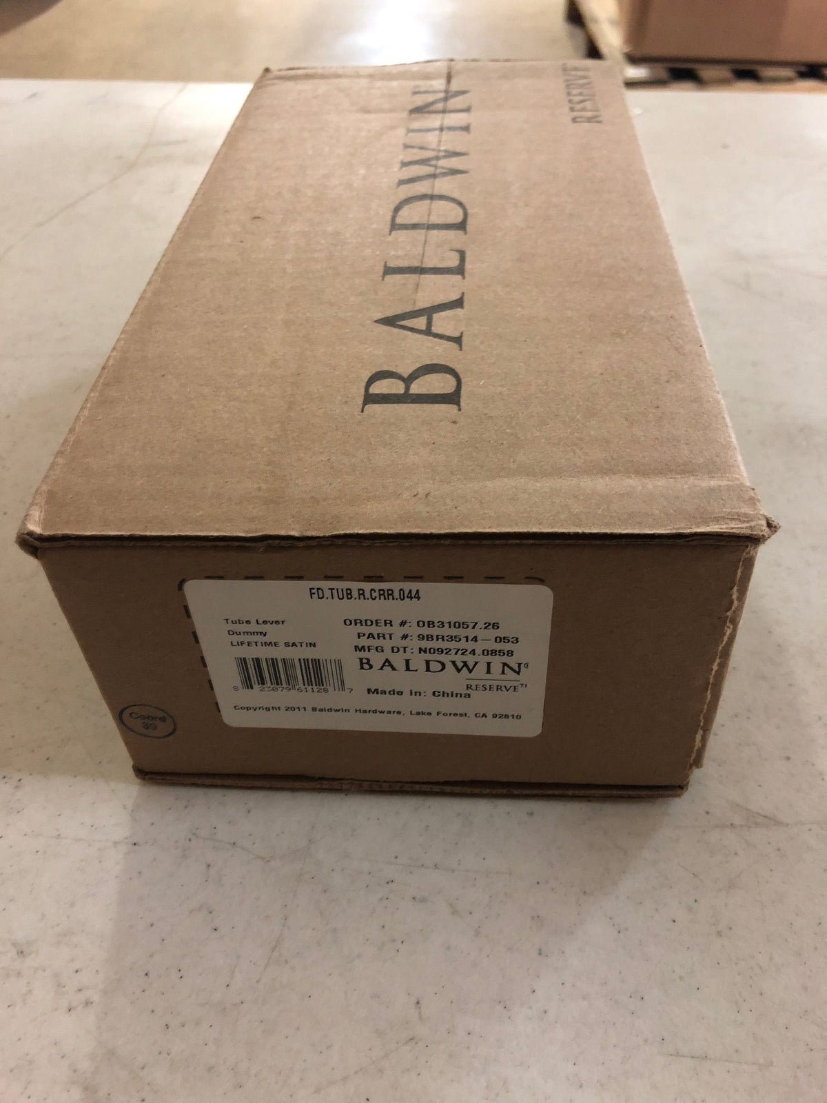 Baldwin FDTUBCRR044 Tube Non-Turning Two-Sided Through-Door Dummy Door Lever Set from the Reserve Collection - Satin Brass