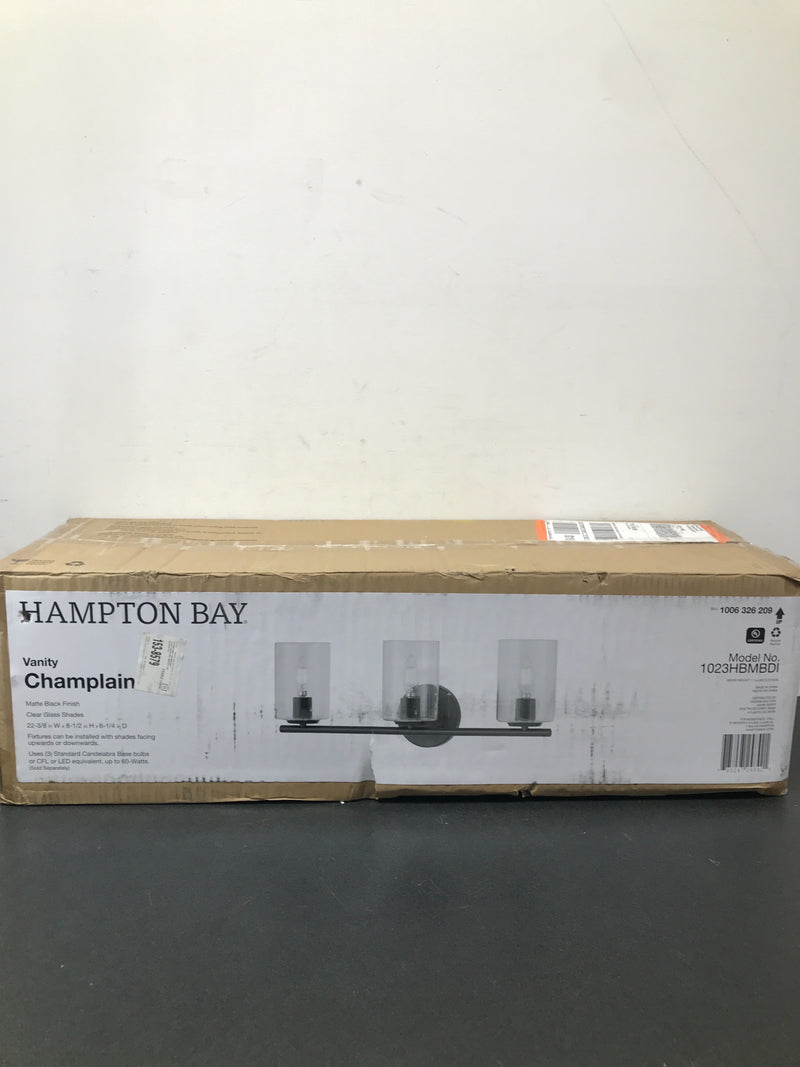 Hampton bay 1023HBMBDI Champlain 22.375 in. 3-Light Matte Black Modern Bathroom Vanity Light with Clear Glass Shades