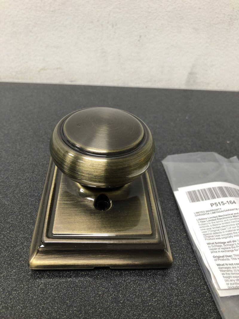 Schlage F170AND609ADD Andover Non-Turning One-Sided Dummy Door Knob with the Decorative Addison Rose - Antique Brass