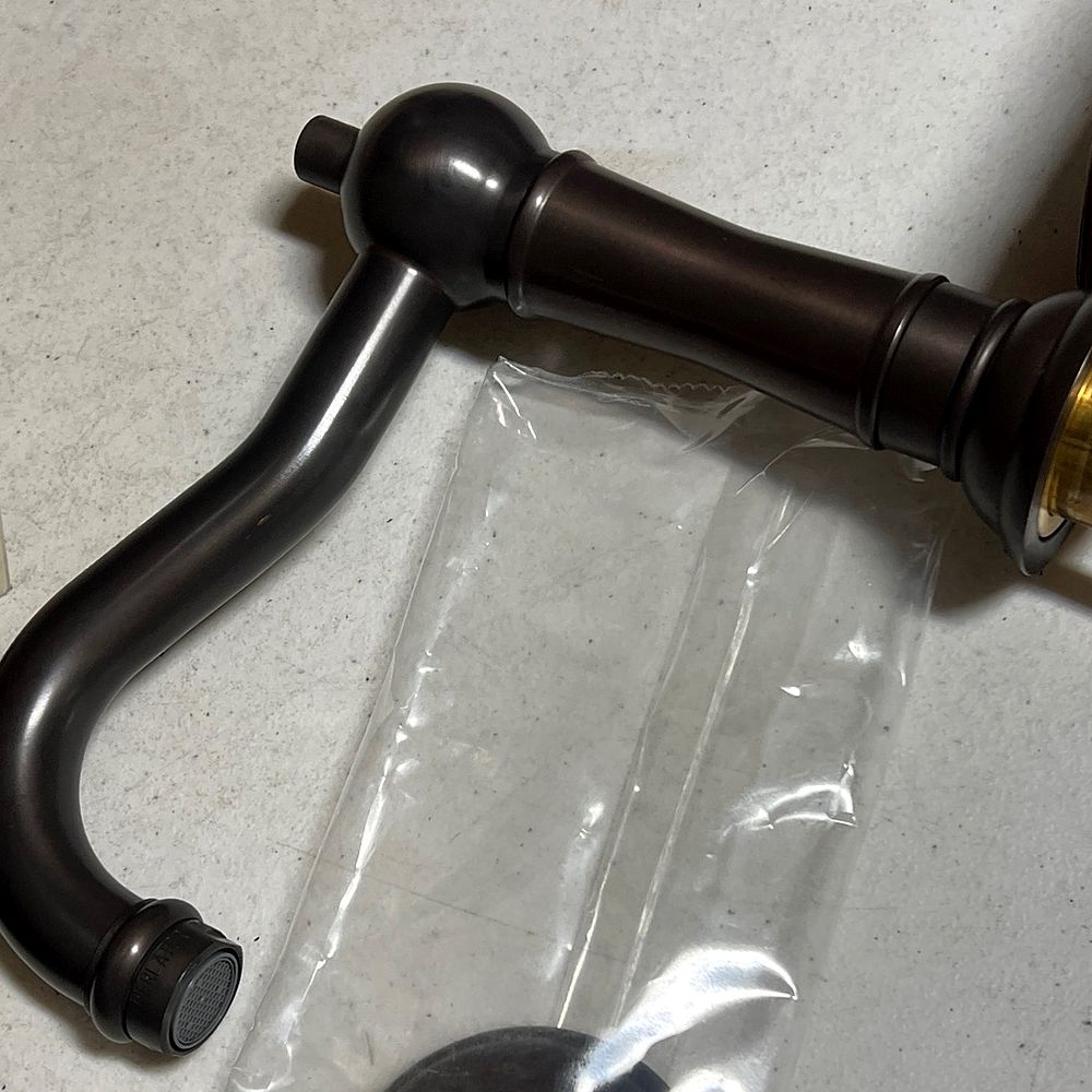 Oil-rubbed bronze faucet spout from Zokos inventory